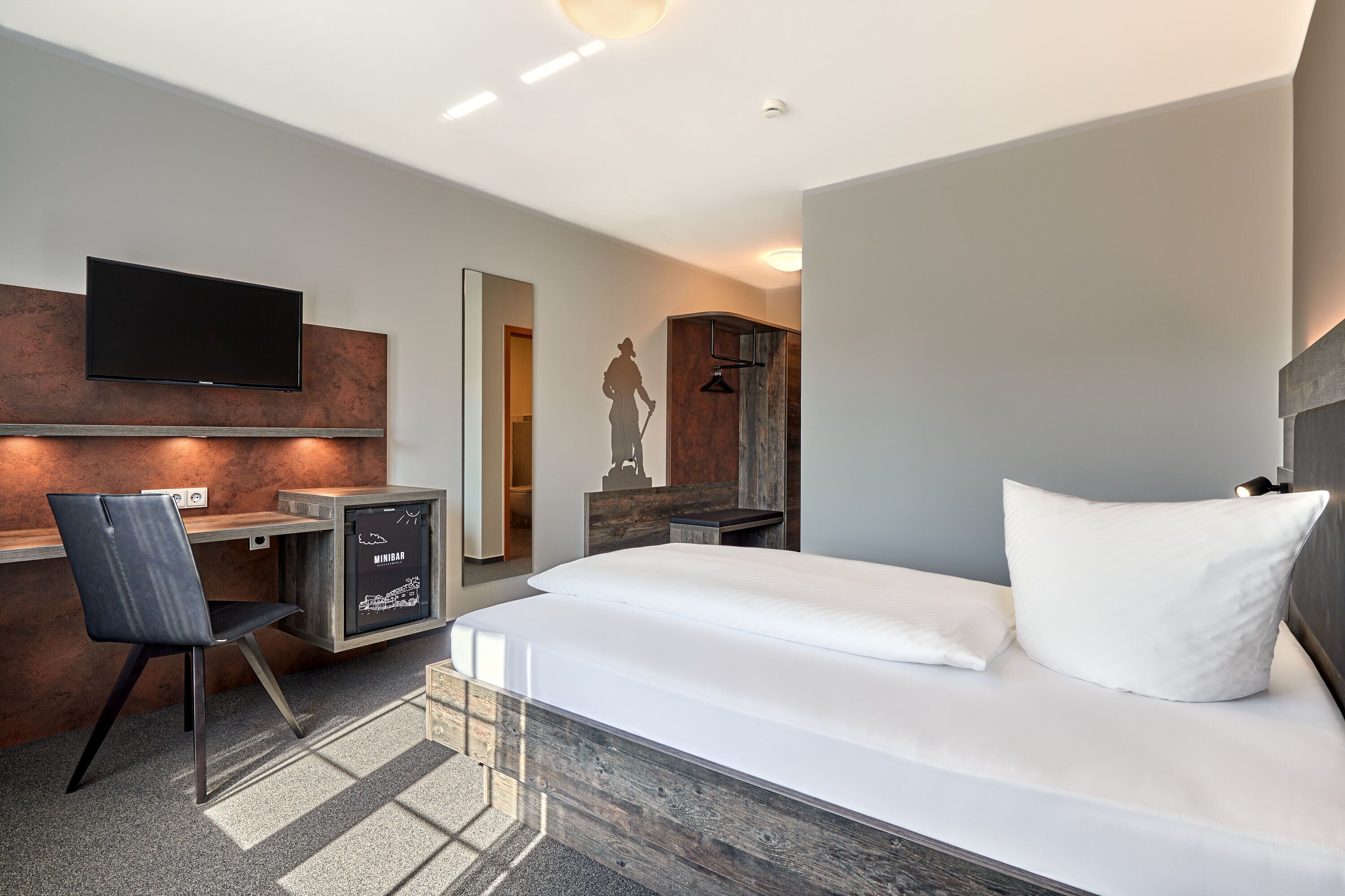 comfort double room | in-room safe, desk, laptop workspace, blackout curtains