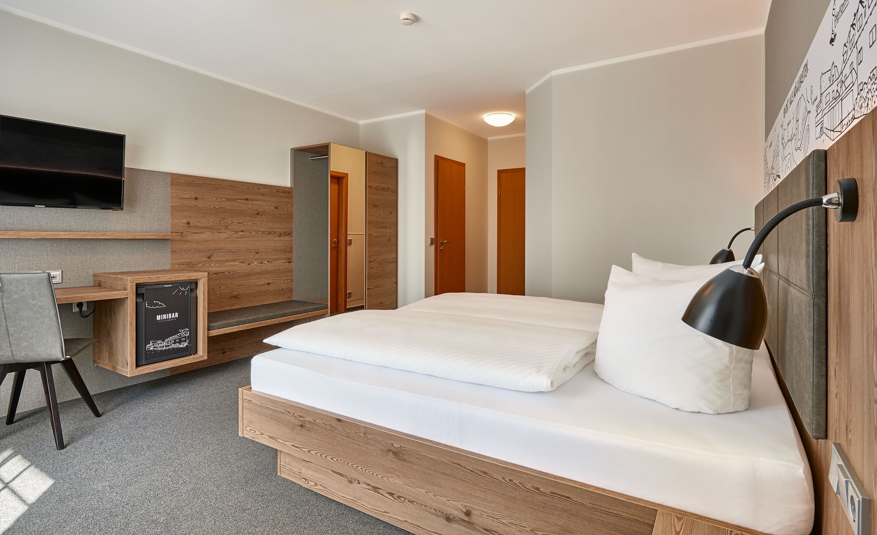 exclusive double room | in-room safe, desk, laptop workspace, blackout curtains