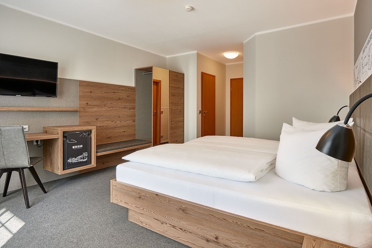 exclusive double room | in-room safe, desk, laptop workspace, blackout curtains