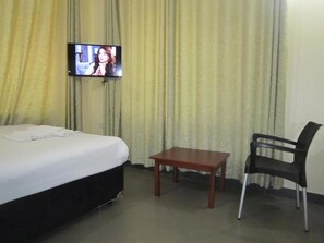 Deluxe Double Room, 1 King Bed, Non Smoking, Courtyard View | Soundproofing, iron/ironing board, free WiFi, bed sheets - FQ Village Hotel (Dar es Salaam)