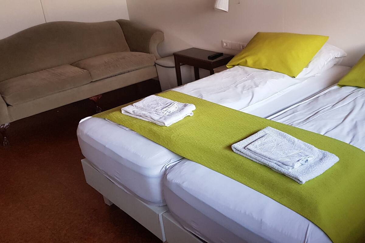 Quadruple Room, Private Bathroom | WiFi (free), bed sheets