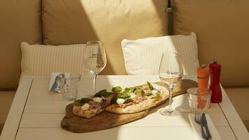 Breakfast, lunch, dinner served; local cuisine, al fresco dining