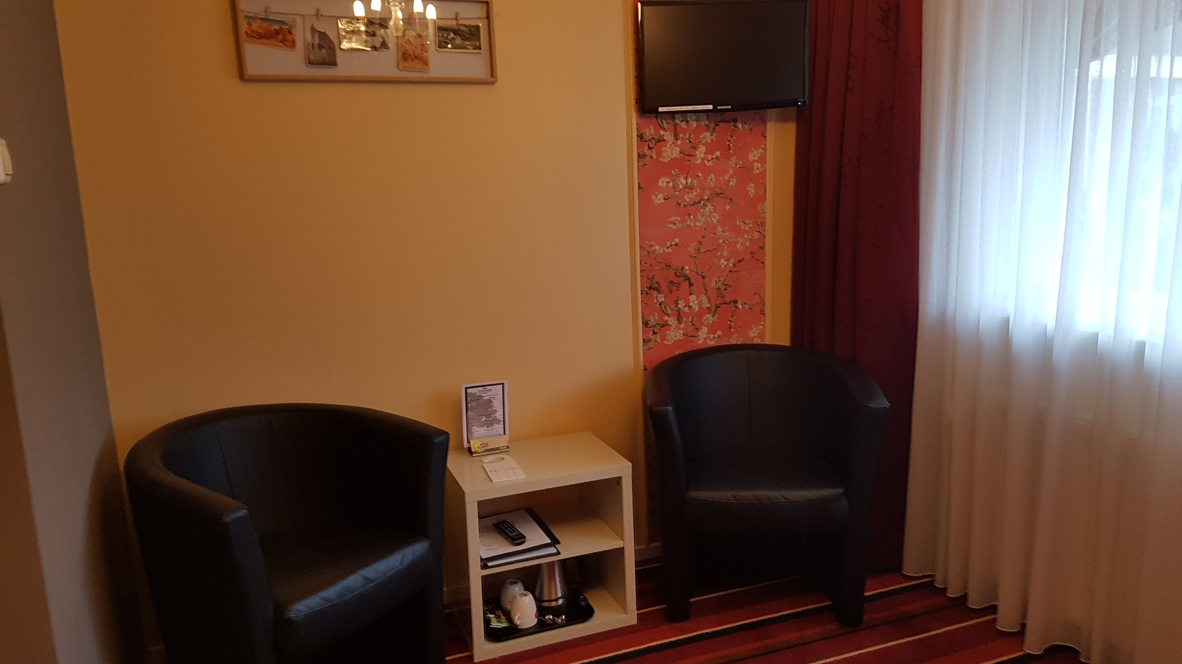 double room, balcony, garden view | in-room safe, desk, soundproofing, free wifi