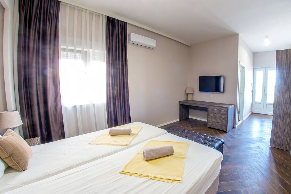 Premium bedding, pillow-top beds, in-room safe, desk