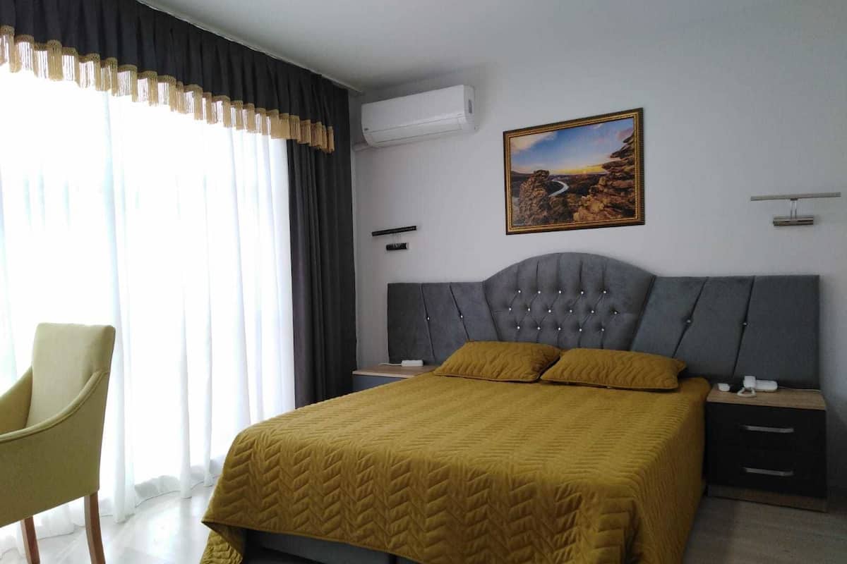 Suite, niet-roken | 1 slaapkamer, lakens van Egyptisch katoen, luxe beddengoed