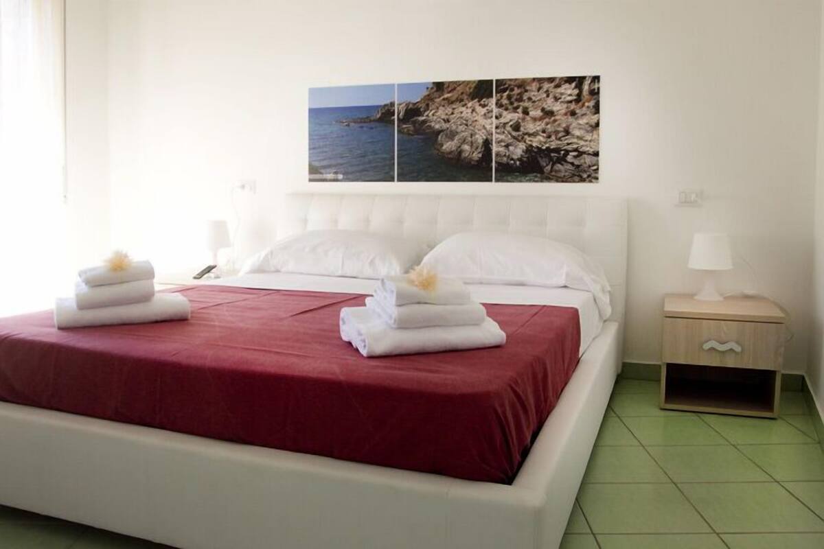 Habitación con 1 cama matrimonial o 2 individuales (sabbia) | Minibar, caja de seguridad en la habitación, wifi gratis y ropa de cama