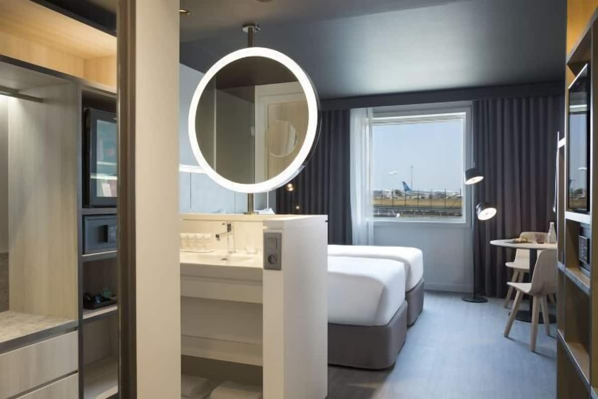 Free minibar items, in-room safe, desk, laptop workspace
