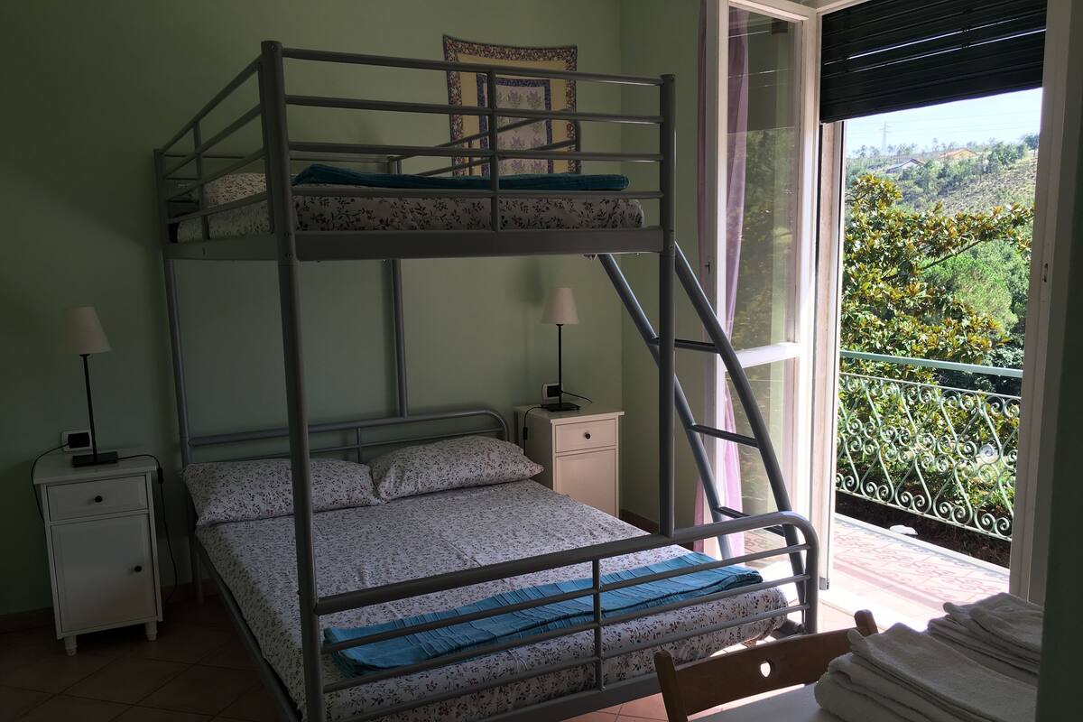 Triple Room, Balcony | Desk, bed sheets