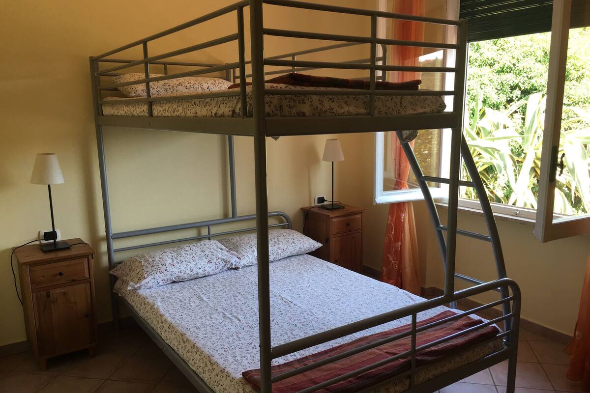 Triple Room, Private Bathroom | Desk, bed sheets