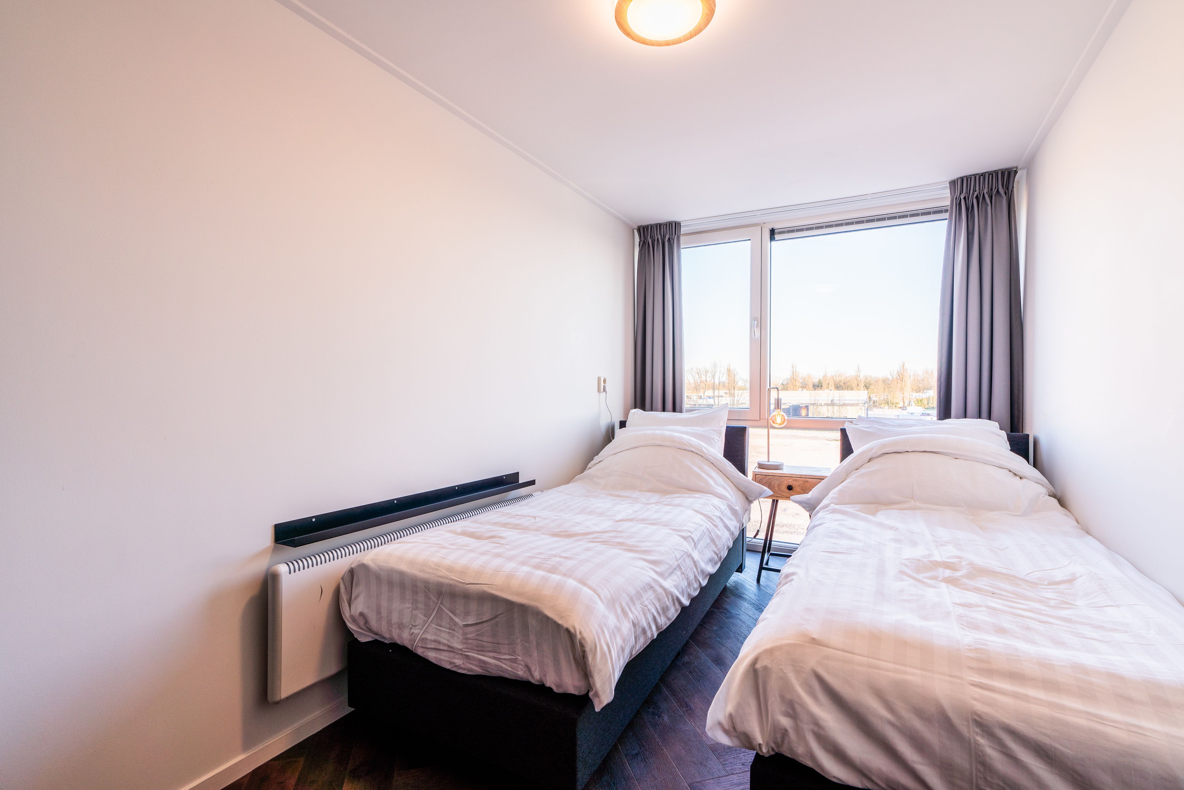 design double or twin room, 1 bedroom | premium bedding, free minibar, individually furnished, laptop workspace