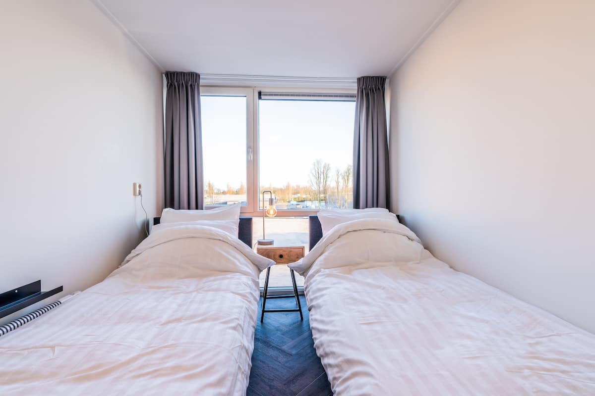 design double or twin room, 1 bedroom | premium bedding, free minibar, individually furnished, laptop workspace