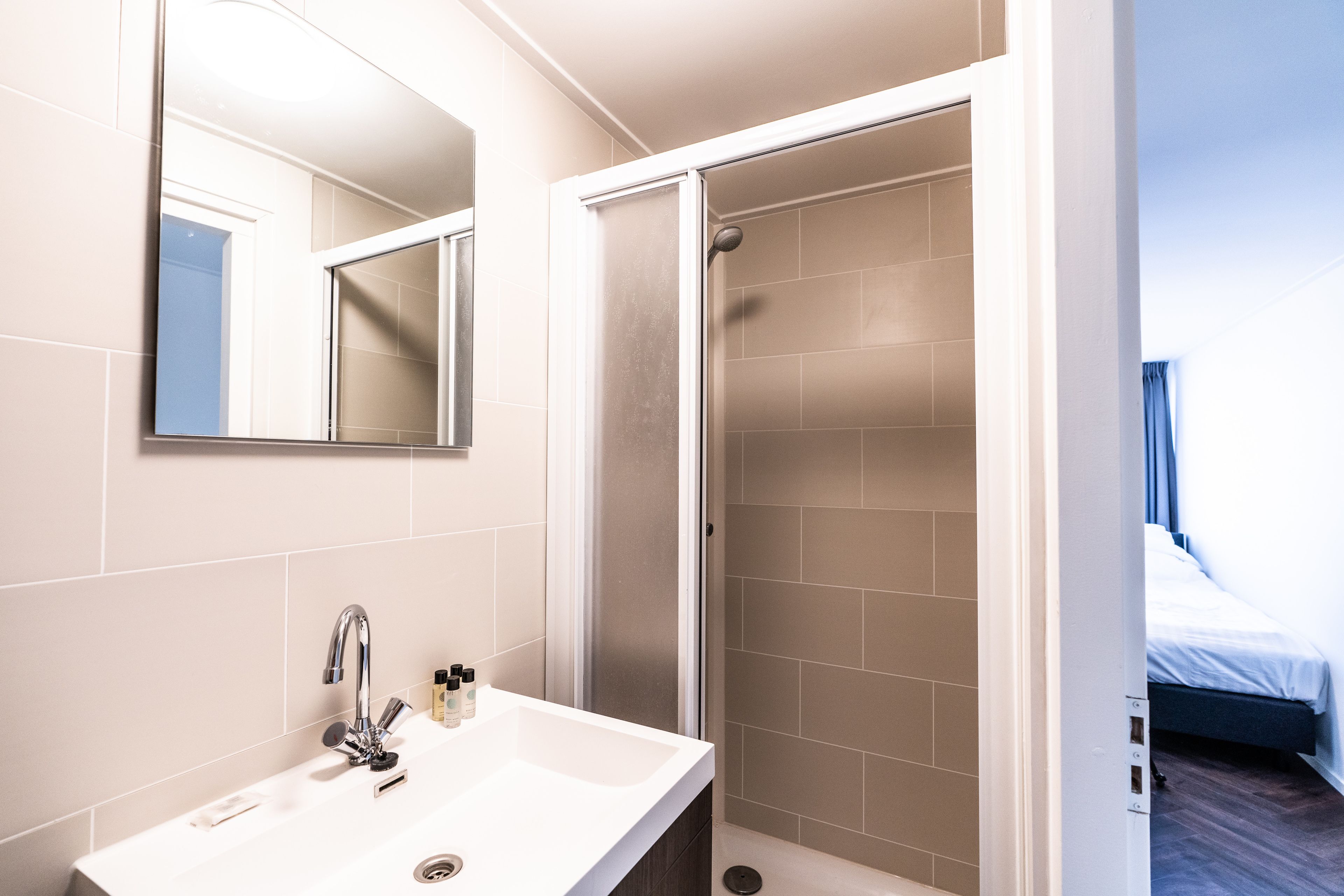 shower, free toiletries, hair dryer, towels