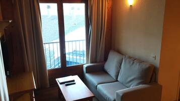 Apartment, 2 Bedrooms (4A Pic Blanc) | Living area | Flat-screen TV