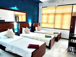 Deluxe Triple Room | Desk, blackout drapes, iron/ironing board, WiFi (free)