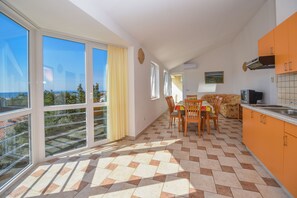 Apartment, Sea View | Living area | TV