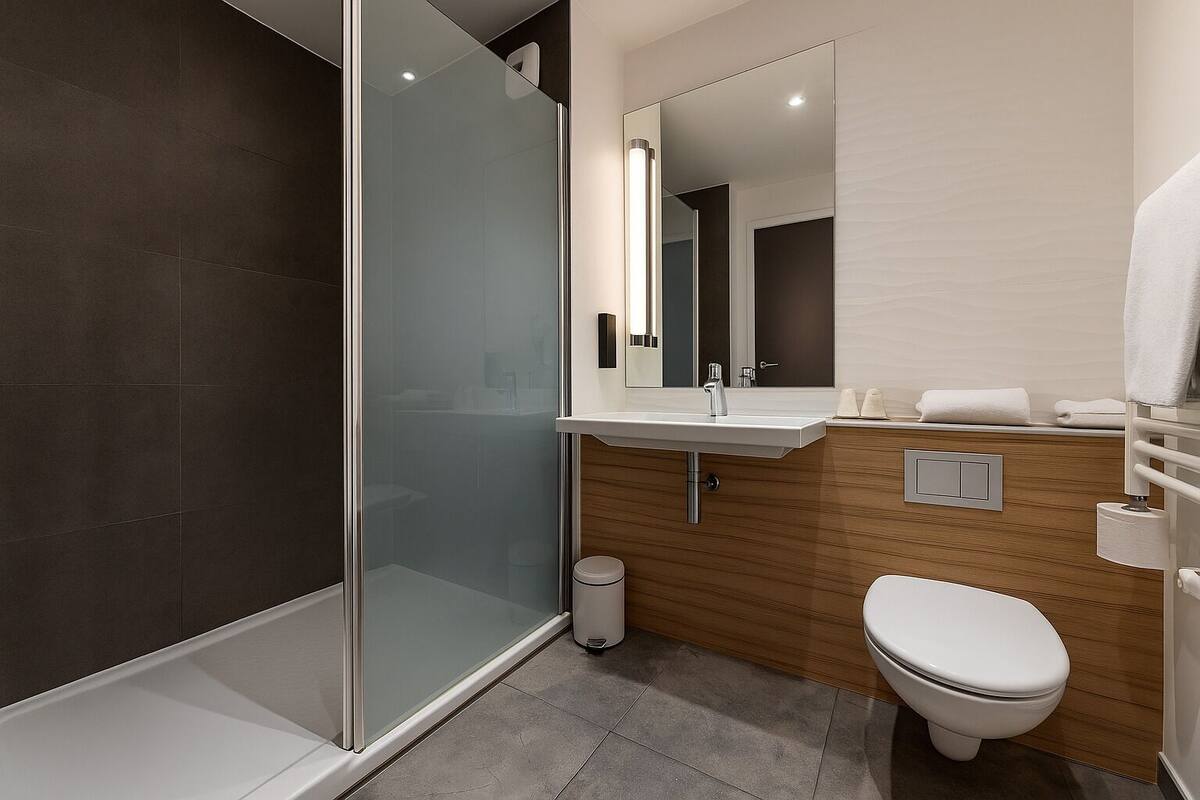 shower, eco-friendly toiletries, towels