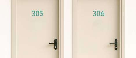 Two doors labeled 305 and 306 with a simple, modern design and a keyhole on the right side.