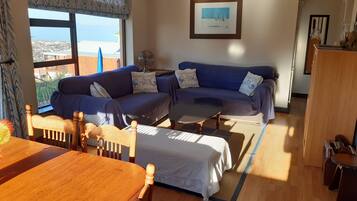 Family Cottage, 2 Bedrooms, Partial Ocean View | Living area | 37-inch TV with digital channels