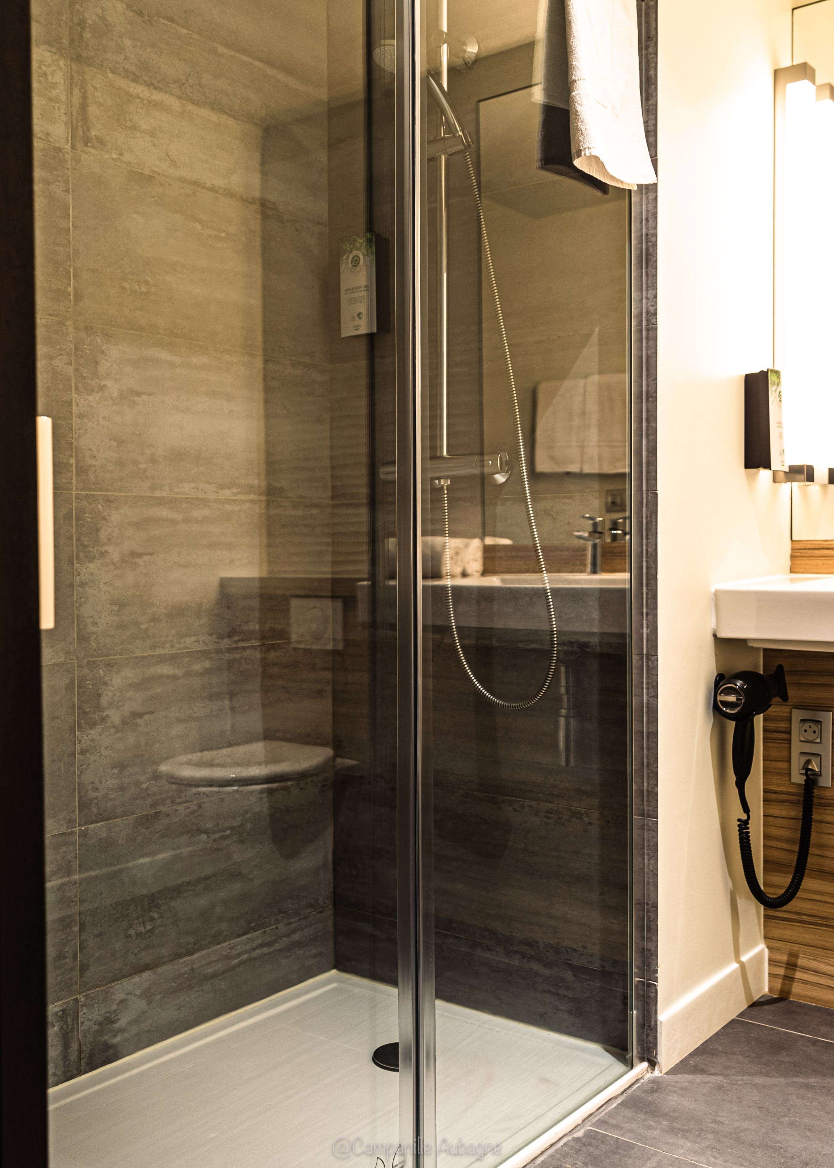 eco-friendly toiletries, hair dryer, towels