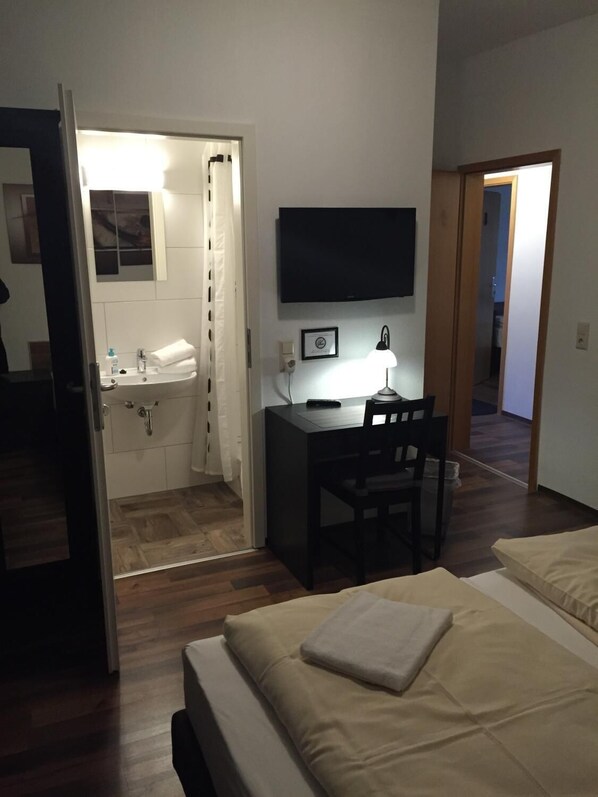 Desk, free WiFi, bed sheets