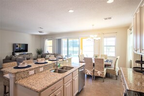 House, Multiple Beds | Private kitchen