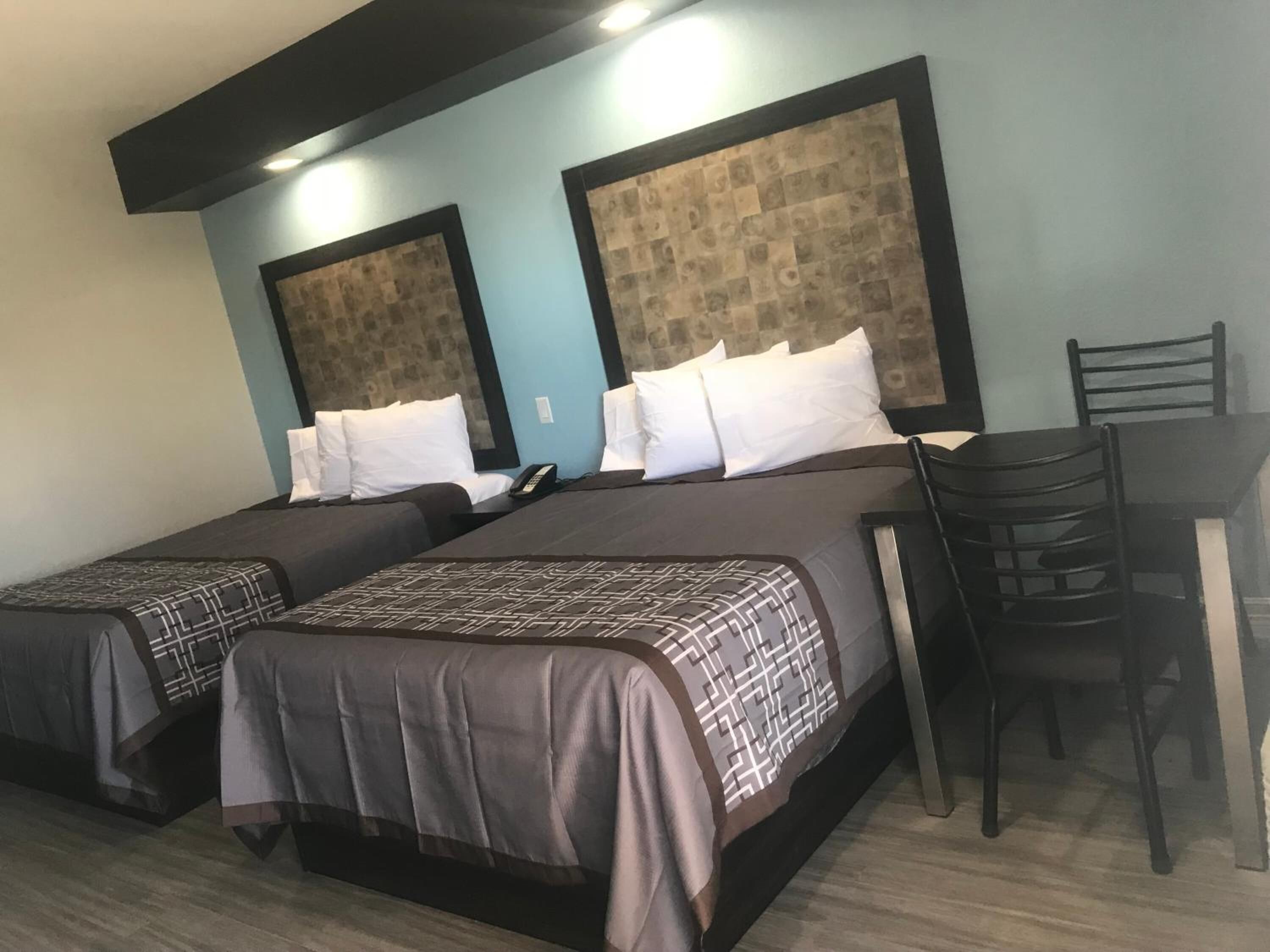 individually decorated, individually furnished, desk, blackout curtains