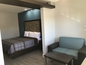 Deluxe Single Room, 1 King Bed, Non Smoking | Living area | 43-inch LED TV with cable channels, TV - The Residency Suites (Houston)