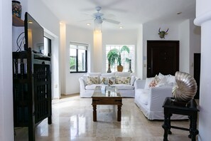 TV, DVD player - 2 Bedroom condo with private Roof top terrance by BRIC at The Royal Palms (Playa del Carmen)