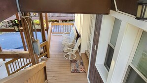 A wooden staircase leading to a covered outdoor area with a bench and a welcome mat. - PROMO 5% WEEKLY AND 10% MONTHLY DISCOUNT!
Beautiful river in front of home (Falling Waters)