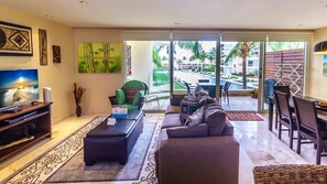 TV, DVD player - Elegant Ocean View Perfectly Situated Just steps from pool and beach at The Elements by BRIC (Playa del Carmen)