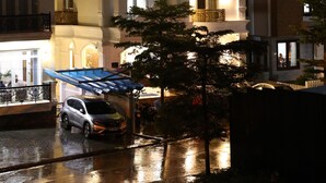 A hotel with a prominent illuminated sign reading "Sugar Land Hotel." - Sugar Land Villa Hotel Dalat (Xuan Huong - Da Lat)