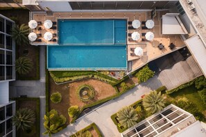 Outdoor pool, pool umbrellas, pool loungers
