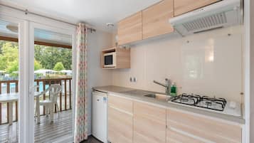 Microwave, freezer, dining tables
