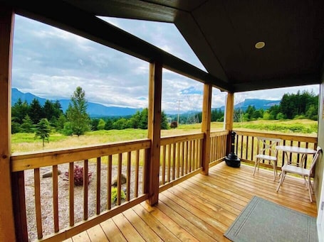 Outdoor dining. Creekside Cabin with Scenic Views at Maple Way Cabins