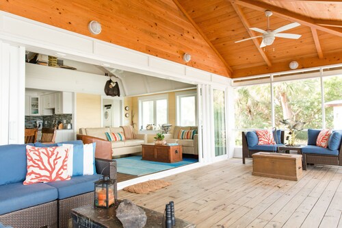 Use our kayaks to explore; your boat is in view at our dock; boardwalk to beach