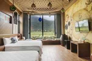 Quadruple Room, Mountain View | Individually decorated, individually furnished, desk, blackout drapes