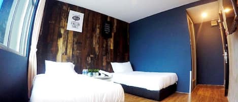 Chambre Deluxe avec lits jumeaux | Wi-Fi gratuit, draps fournis