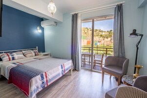 Standard Tek Büyük Yataklı Oda, Balkon, Bahçe Manzaralı | Minibar, masa, ses yalıtımı, ücretsiz kablosuz İnternet 