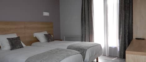 Individually decorated, individually furnished, desk, blackout drapes