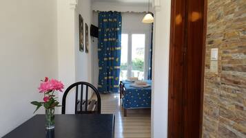 Apartment, 2 Bedrooms | Living area | Flat-screen TV