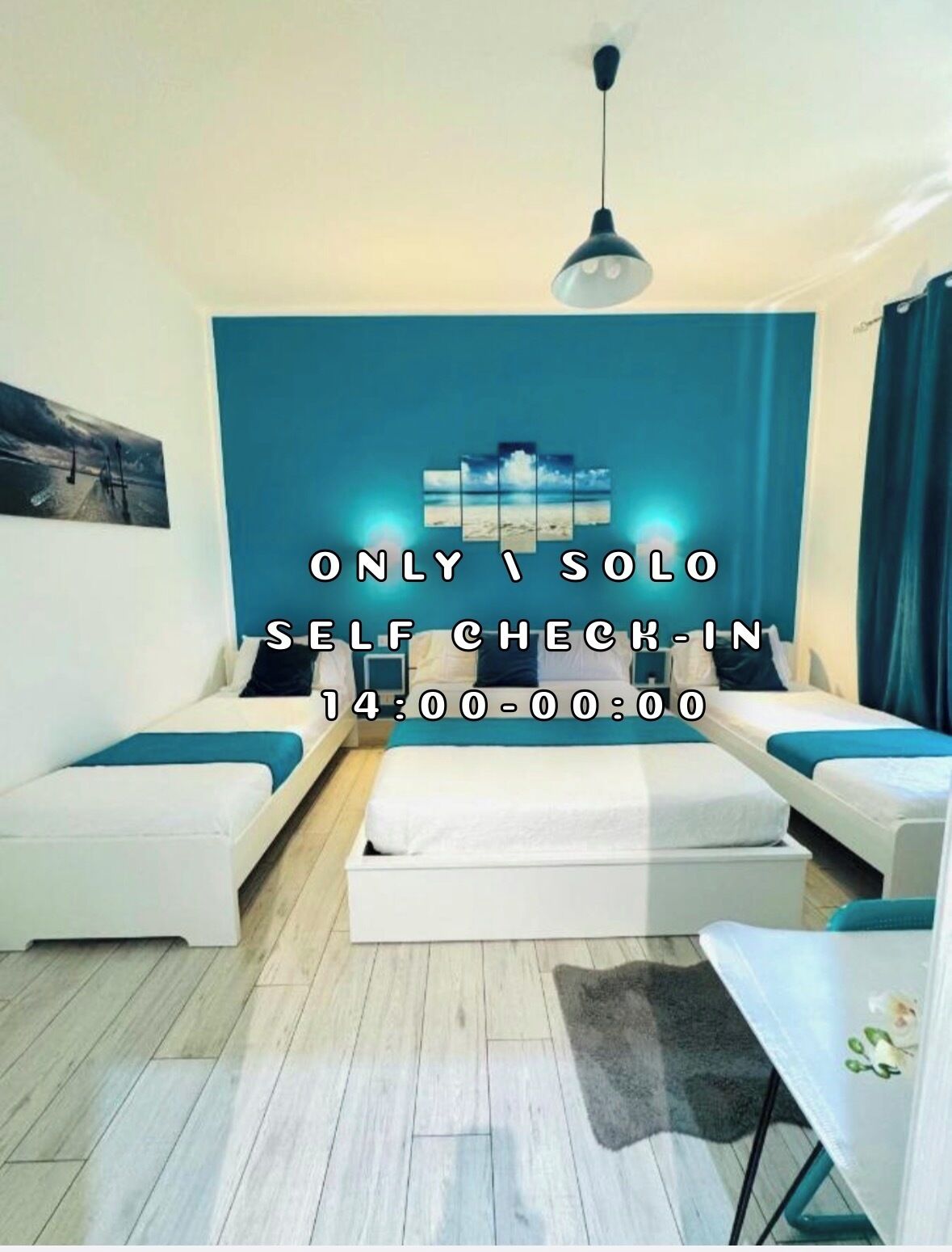 Triple Room, City View | Minibar, desk, blackout drapes, soundproofing