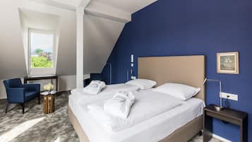 1 makuuhuone, ylelliset vuodevaatteet, tallelokero huoneessa