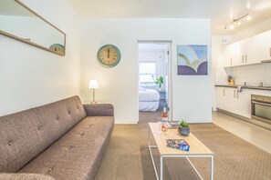 Apartment, 1 Bedroom | Living area | Flat-screen TV - Modern Inner West 1 Bed with Parking in Ashfield (Ashfield)