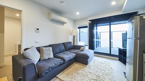Apartamento, 2 habitaciones | Zona de estar
