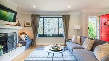 Apartment, 2 Bedrooms | Living area | Flat-screen TV