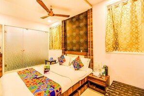 Premium bedding, pillow-top beds, desk, free WiFi
