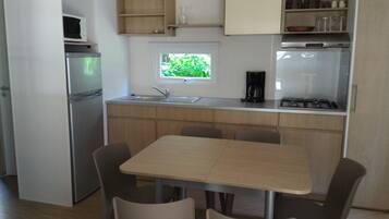Family Mobile Home, 3 Bedrooms | Private kitchen | Full-size fridge, microwave, stovetop, coffee/tea maker