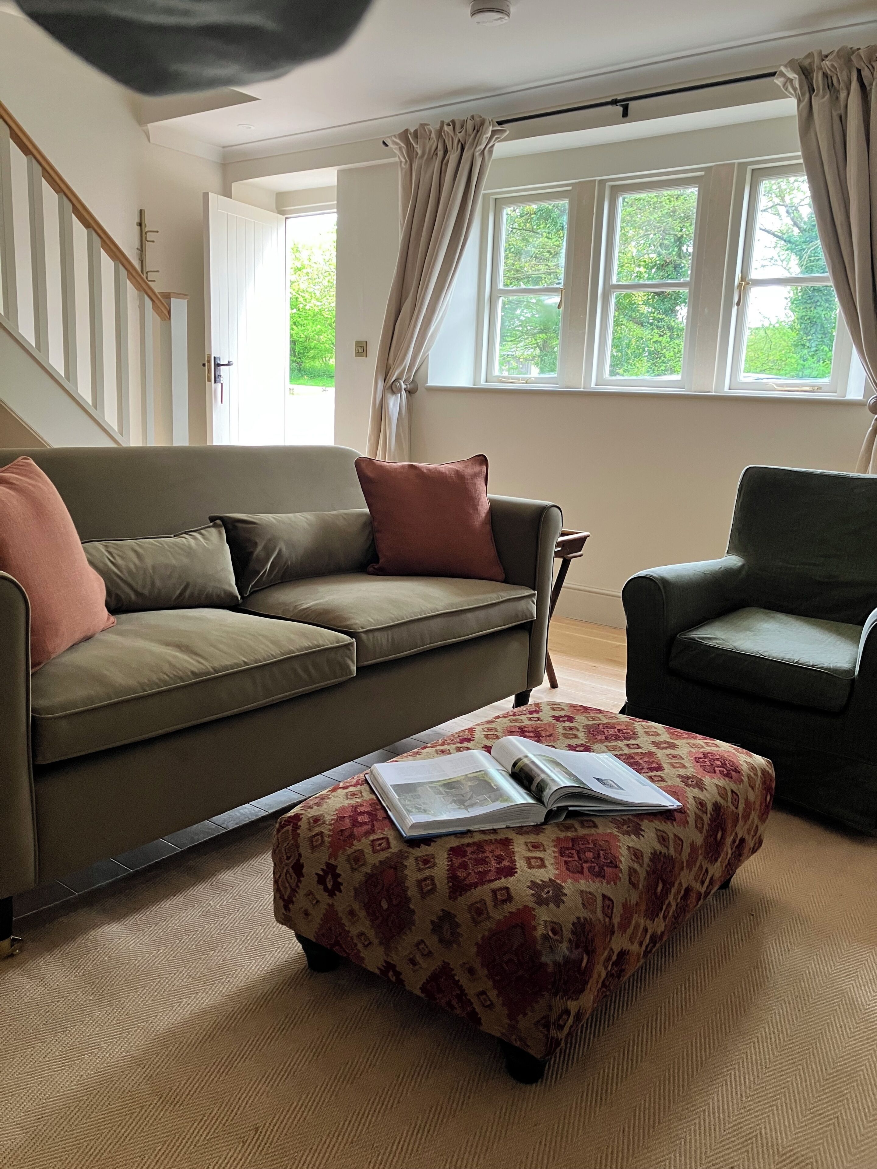 One Bedroom Cottage | Living area | Flat-screen TV, heated floors