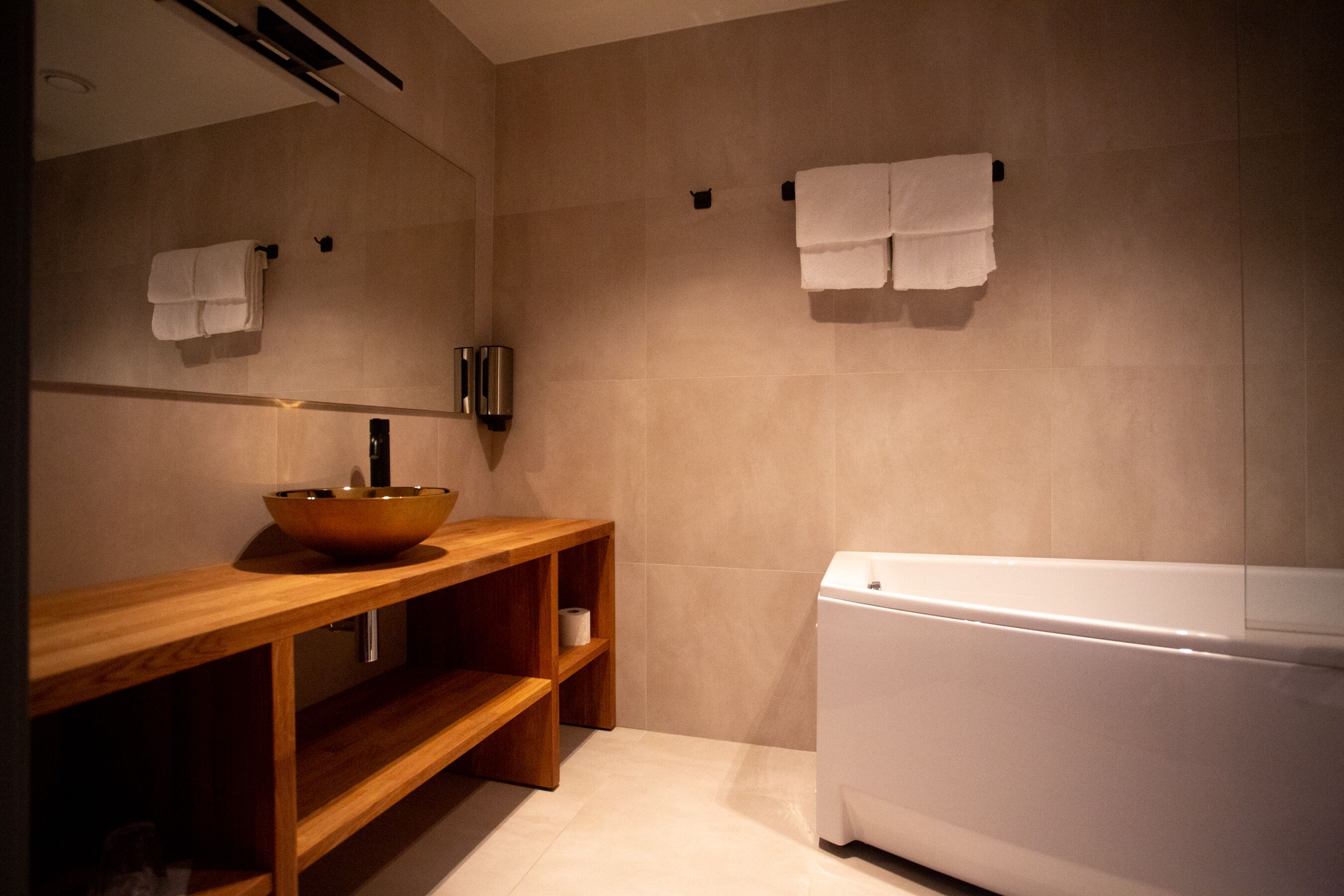 senior studio suite | bathroom | hair dryer, towels