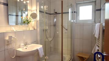 Shower, free toiletries, hair dryer, towels